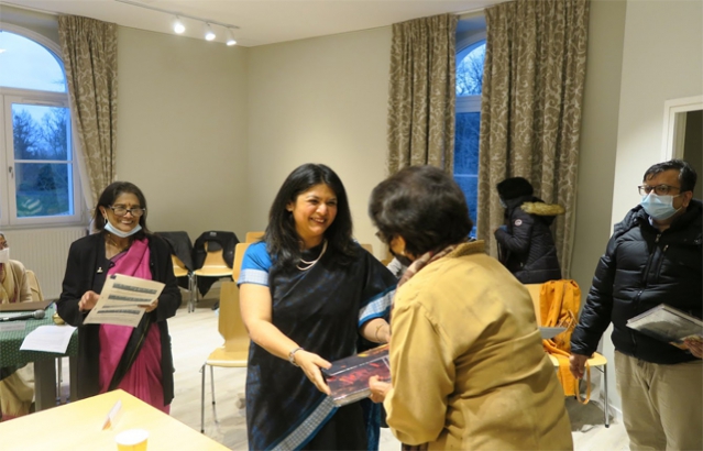 MRS. SHRILA DUTTA KUMAR, MINISTER FOR CONSULAR AFFAIRS, EMBASSY OF INDIA DISTRIBUTING BOOKS TO PANEL MEMBERS